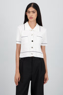 Top manga corta cuello camisero detalle linea