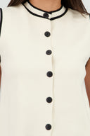 Chaleco tejido botones contrastes