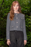 Saco tweed con bolsas y botones