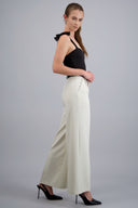 Tailored trousers with belt buckle