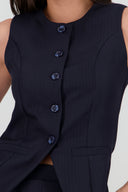 Chaleco cuello redondo estampado rayas