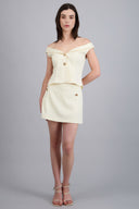 Falda corta detalle botones metalicos