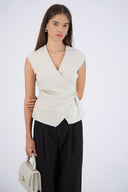 Top tejido suave detalle cintura