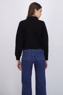 Suéter cuello polo brillos