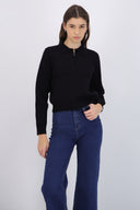 Suéter cuello polo brillos